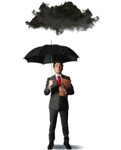 man standing under umbrella and black cloud